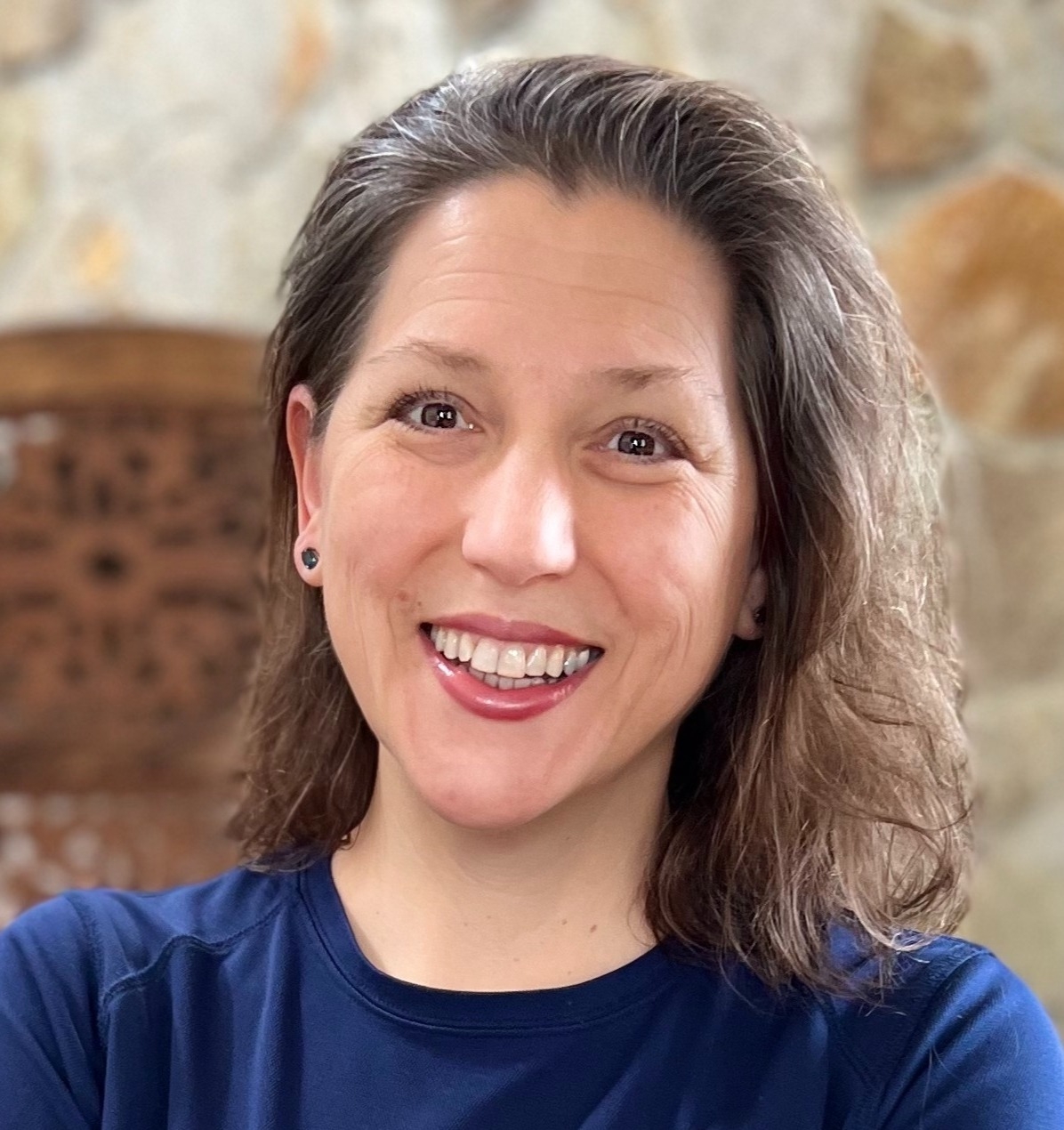 Our smiling founder Julie Robbins who supports our amazing massage in CT team